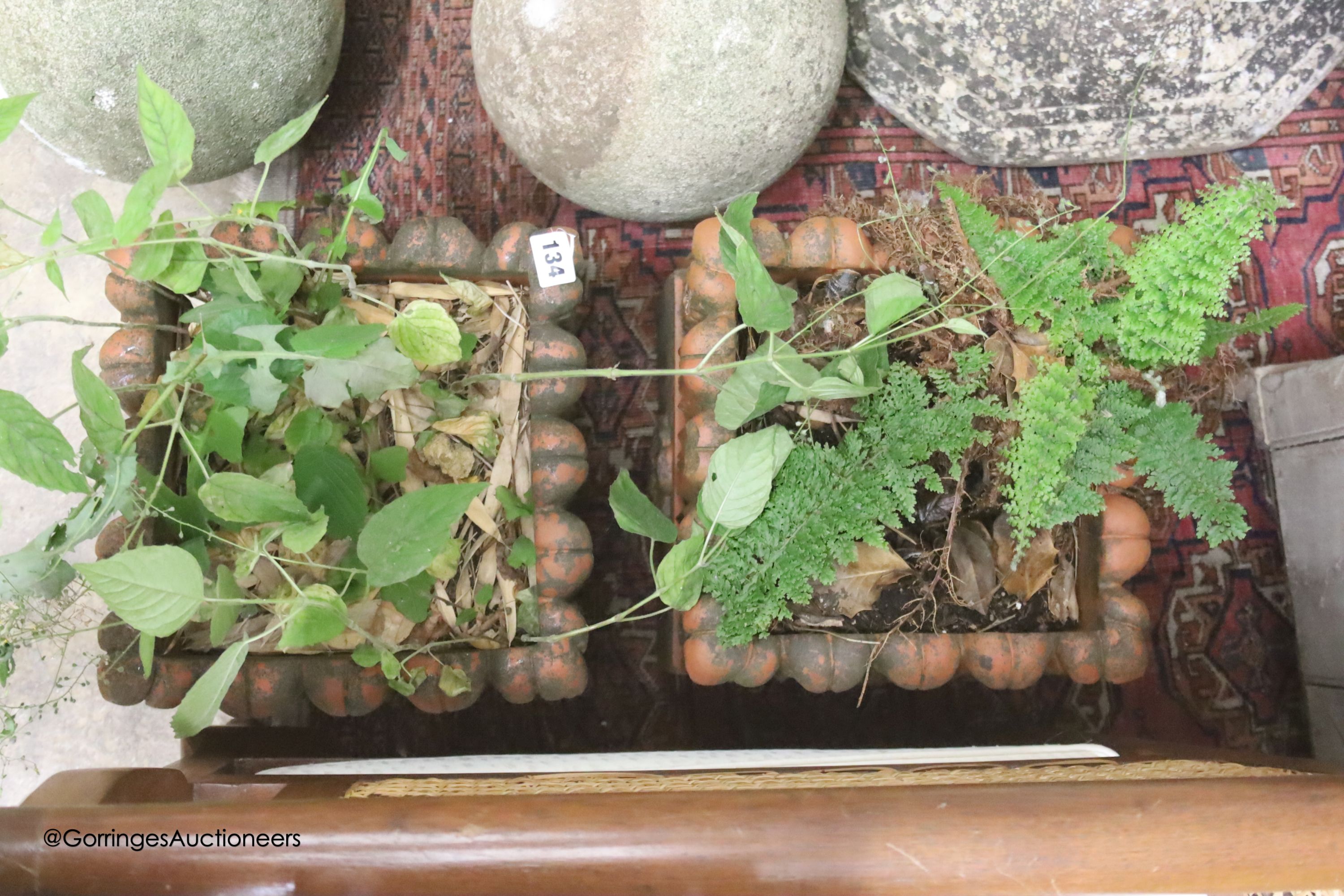 A pair of square terracotta garden urns, width 26cm height 29cm